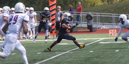 Football Holds On For First Season Win at Robert Morris